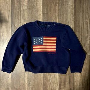 Size 4t Runs small!!! 
Ralph Lauren Navy Sweater with American Flag